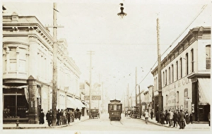 American street scene with tram and people American street scene with tram and people