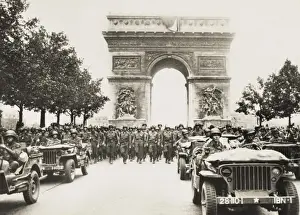 American troops parade in the Champs Elysees