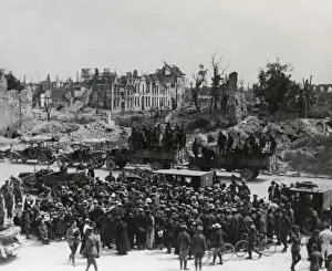 Torn Prints: American troops and transport on a road in France, WW1