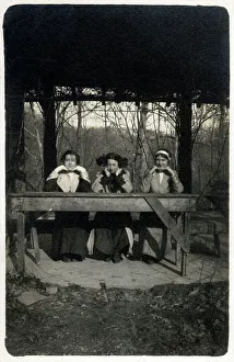 Three American Women posing with hands on their chins