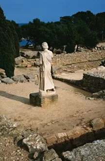 Ampurias. Ruins whit statue of Asclepius. Catalonia. Spain