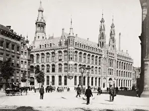Amsterdam, crowded street with pedestrians and historic buildings
