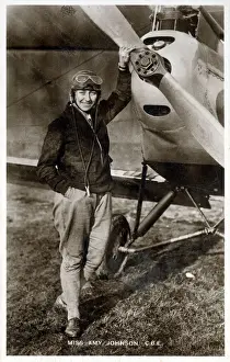 Johnson Prints: Amy Johnson CBE (1903-1941) - pioneering English female pilot - pictured standing in