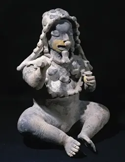 The Ancient Jama-Coaque Culture. Ecuador. Male figure sittin