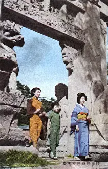 Ancient Japanese stone gate with Shishi Lion Guardians