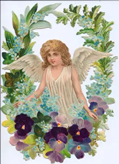 Angel surrounded by flowers on a Victorian scrap