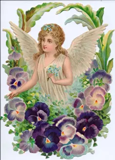 Angel surrounded by flowers on a Victorian scrap