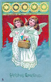 Angels with basket of gifts on a Christmas postcard