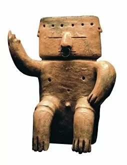 Precolumbian Collection: Anthropomorphic figure of a man seated with nose