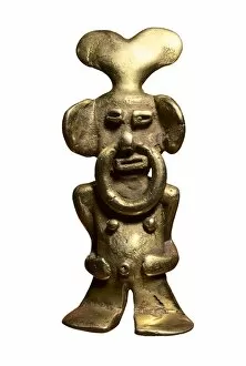 Precolumbian Collection: Anthropomorphic gold figure decorated with a nose