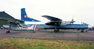 Antonov Gallery: Antonov An-26 1604 & Cessna Bird Dog F-BIFB