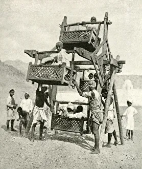 Images Dated 7th August 2018: Arab children on playground ride, Gulf of Aden, Arabia