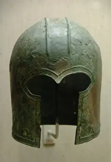 Eighth Prints: Archaic bronze helmet. Corinthian type. 700-675 B. C. Greece