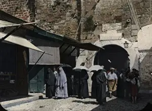 Suggests Prints: Archway in a large stone wall