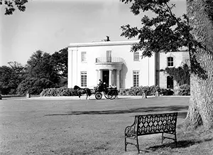 Arlington Court, Devon, with horse-drawn carriage