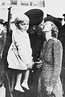 Armed London fireman reunited with family, WW2 Armed London fireman reunited with family, WW2
