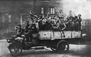 Petrograd Prints: Armed soldiers riding in a truck, Petrograd, Russia