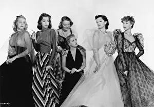 These Prints: An array of Dolly Tree gowns in These Glamour Girls (1939)