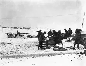 Artillerymen in the snow with shells, WW1