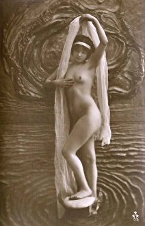 Poses Collection: Artistic Italian nude standing amid stylised watery backdrop