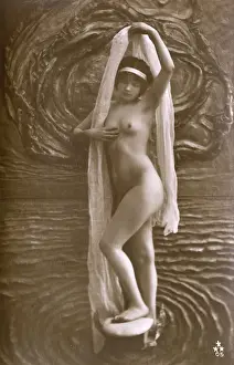 Body Prints: Artistic Italian nude standing amid stylised watery backdrop