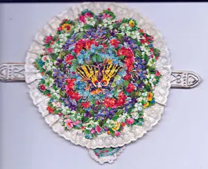 Assorted flowers on a circular greetings card