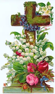 Assorted flowers on a cross-shaped greetings card