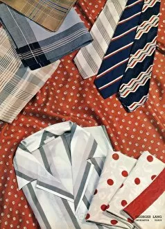An assortment of mens ties, hankies and shirts