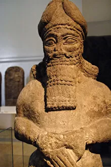 Assyrian Gallery: Assyrian figure of an attendant god. Nimrud