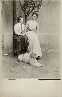 Images Dated 21st June 2018: Austrian Mother and Daughter with their shaggy pet dog