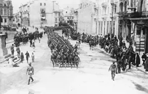 Austrian troops marching through a town, Romania, WW1