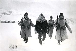 WWI Soldiers Gallery: Austrian troops with suspect peasant, Galicia, WW1