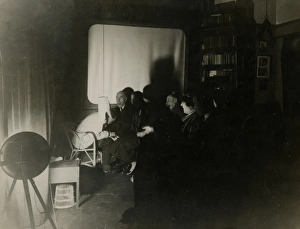 Sance Gallery: Automatic photograph of sitters and Rudi Schneider at a san
