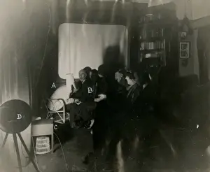 Automatic photograph of sitters and Rudi Schneider at sance