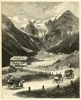 Automobiles passing the Trafoi Hotel at Stilfserjoch, Italy