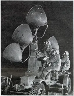 Homefront Prints: Auxiliary Territorial Service using search lights at night to spot on coming aircraft