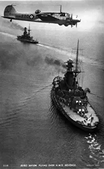 Avro Anson I K6206 flying over HMS Revenge