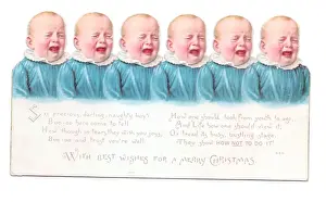 Frill Prints: Six babies in blue on a cutout Christmas card