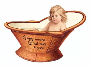 Images Dated 9th December 2015: Baby in a hip bath on a cutout Christmas card