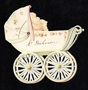 Images Dated 15th May 2018: Baby in a pram on a cutout greetings card