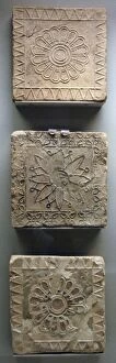 Babylon. Terracotta tiles decorated in floral motifs. Dated