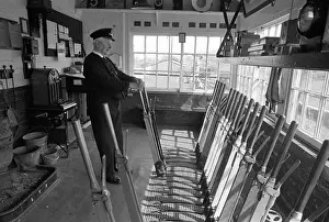 Bala Lake Railway guard Bob Davies operates the signal box