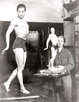 Poses Collection: Ballet dancer poses for sculptor, Paris, 1933