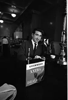 Barman in a pub, Belfast, Northern Ireland