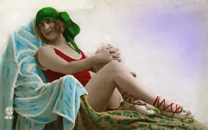Laced Prints: Bathing beauty reclining on a couch