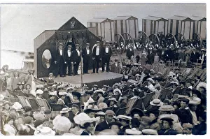 Eastbourne Prints: Beach entertainers lined up on stage at Eastbourne beach