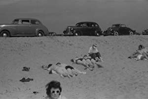 Undressing Gallery: Beach scene at New Beach, the most popular beach near Provin