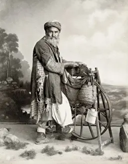 Grind Prints: Bearded Egyptian man sharpening knives on grind stone