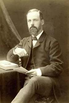 Bearded man in cabinet photograph