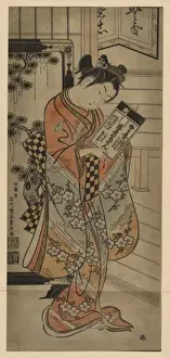 Beauty holding a book